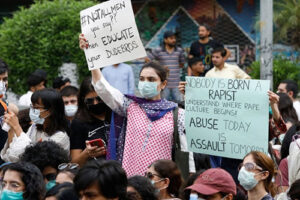 Protesters in Karachi carry signs against a gang rape that occurred along a highway and to condemn violence against women and girls edited | Environment, Featured from Narratives Magazine