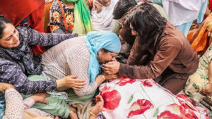 Family members mourns the killing of Bashir Ahmad Khan after he body was brought at his residence in Srinagar Kamran Yusuf edited | Narratives-InFocus from Narratives Magazine